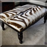 F20. Zebra ottoman. 19”h x 44”w x 30”d 